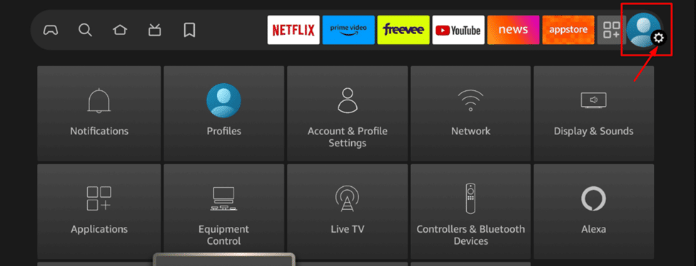FireStick home screen showing the gear icon (Settings) highlighted in the top-right corner.